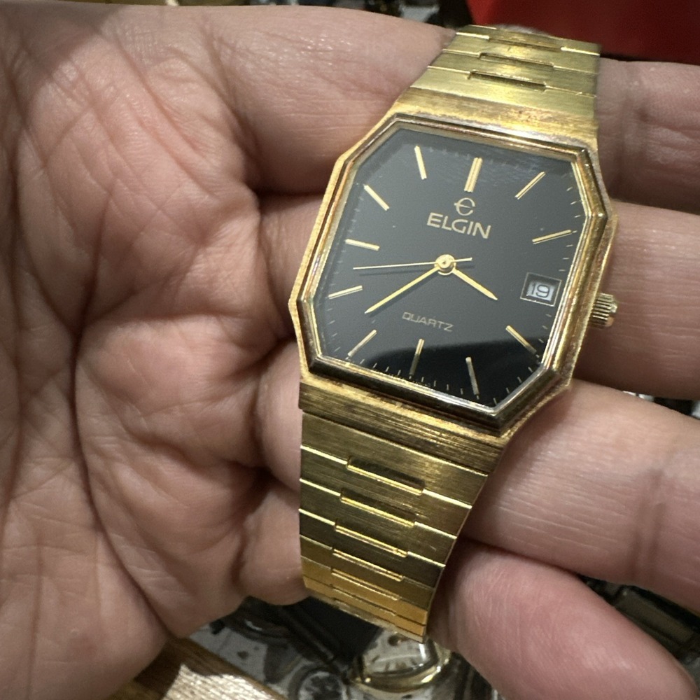 Vintage Elgin Flatline Mens Hexagon Tank Watch Gold Tone Black Dial Date Quartz